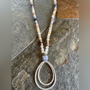 Crystal necklace with a pear shaped solver pendant